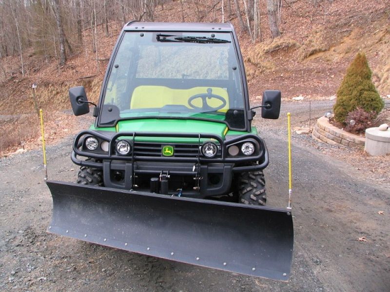 = $4,250 = 2011 John Deere Gator 825i w/ Plow