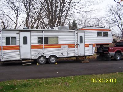 WE MOVE TRAILERS , BOATS AND EQUIPMENT !!!