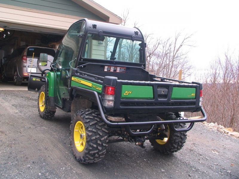 = $4,250 = 2011 John Deere Gator 825i w/ Plow