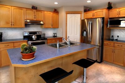 PRICE REDUCED: Cranston House for Sale: 24 Cranfield CI SE 